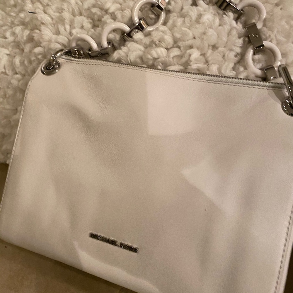 White Michael Kors small/medium handbag 8by9 inches wear long or short